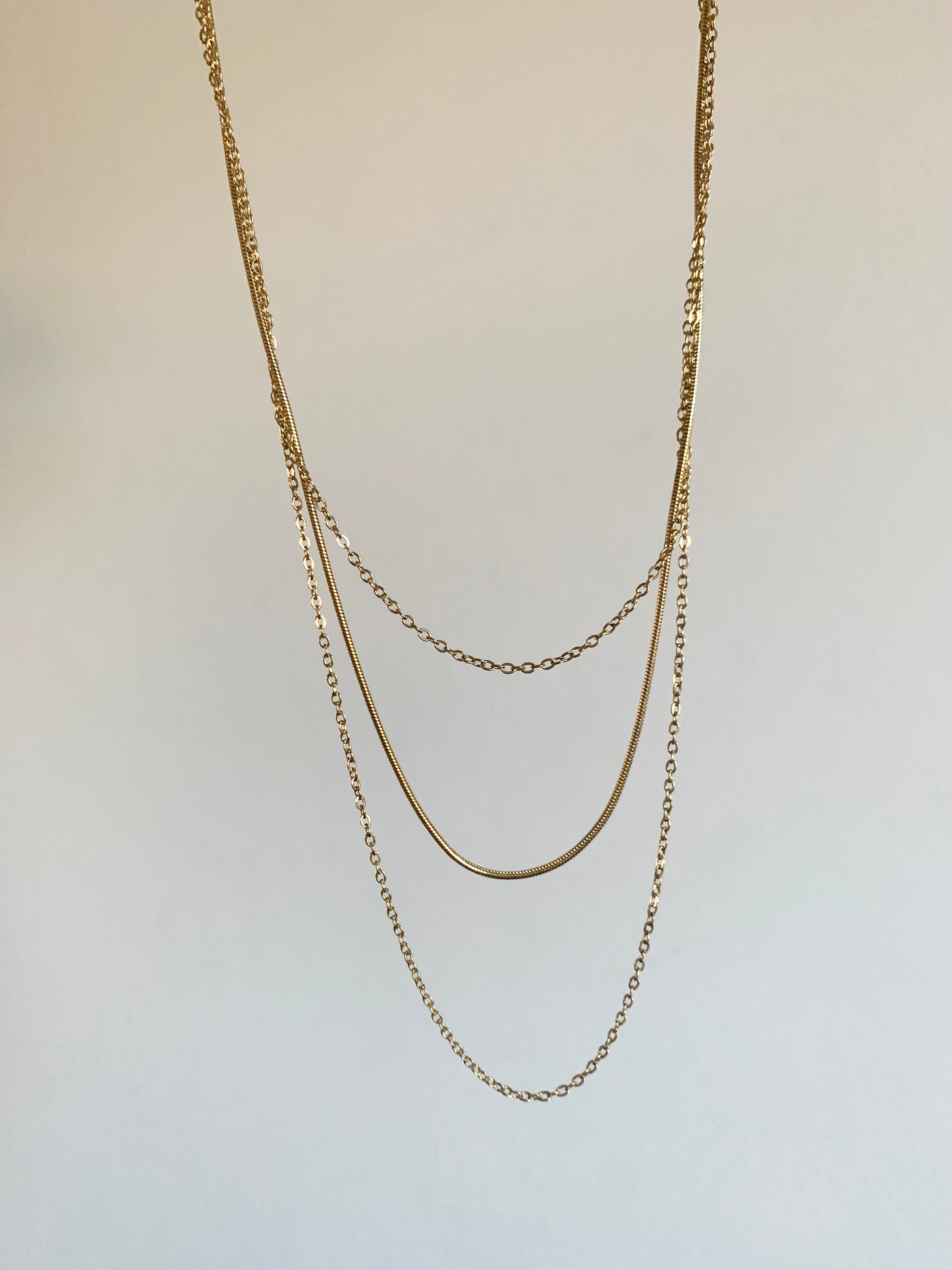 Collier triple rang