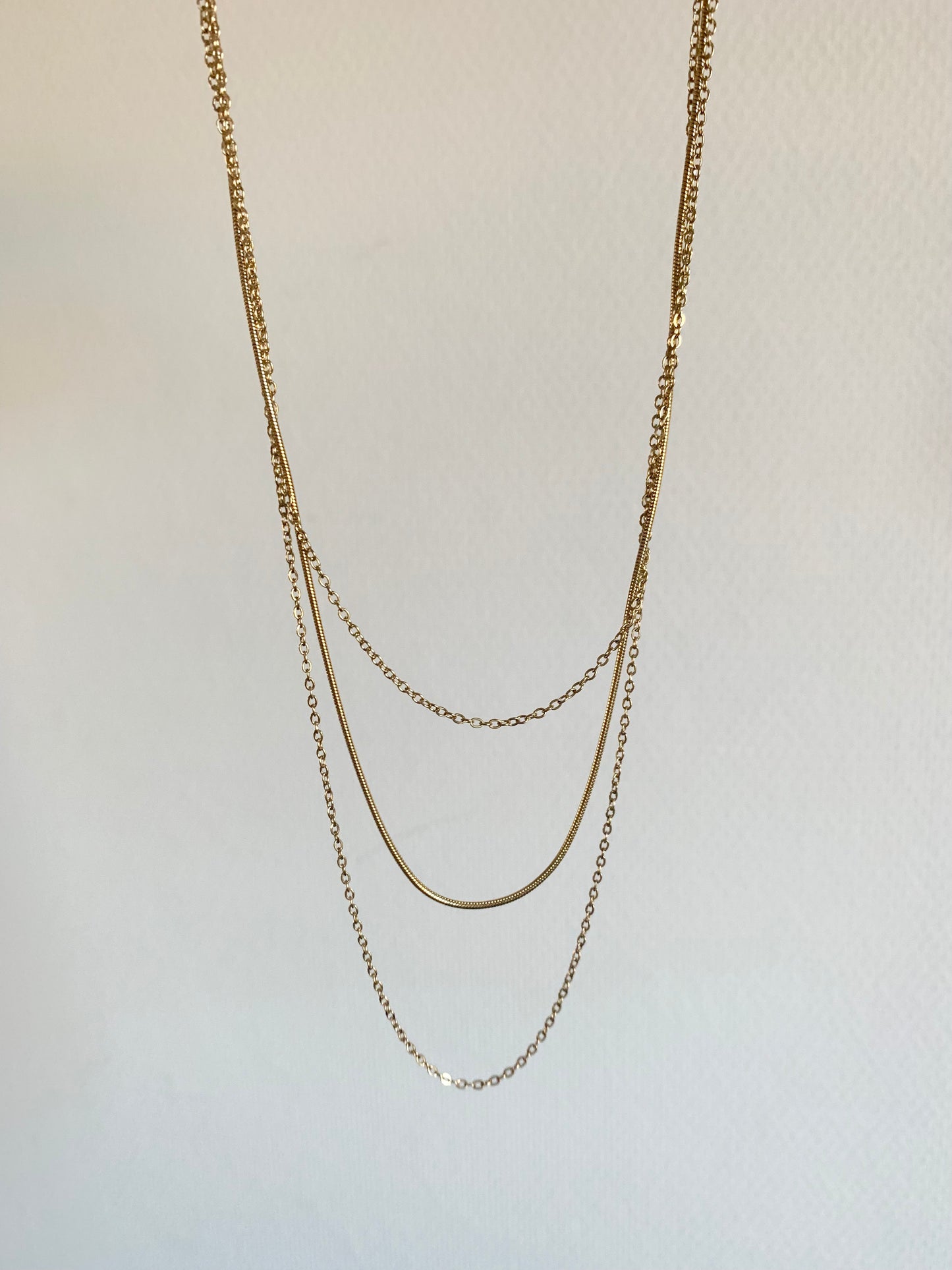 Collier triple rang