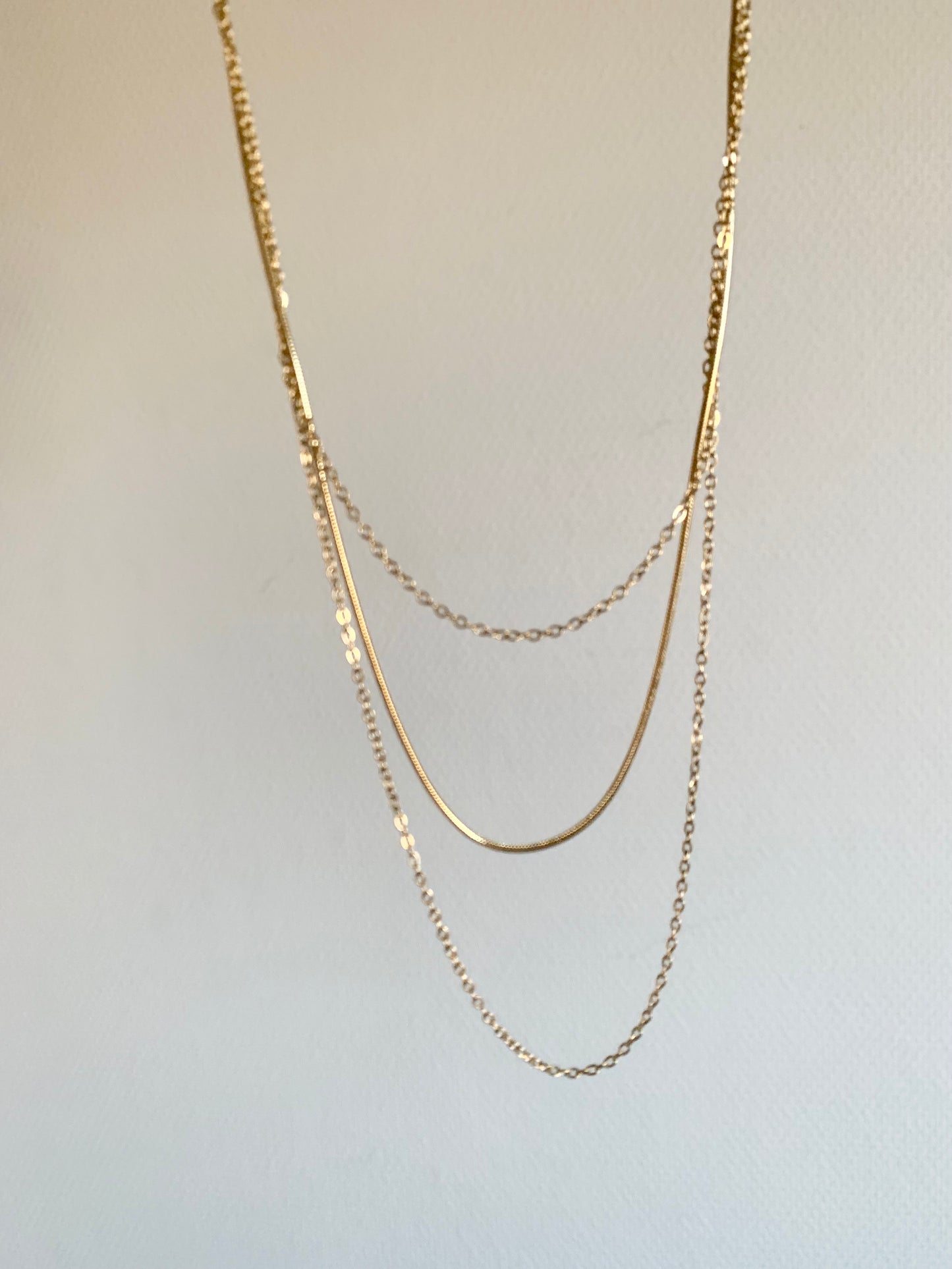 Collier triple rang
